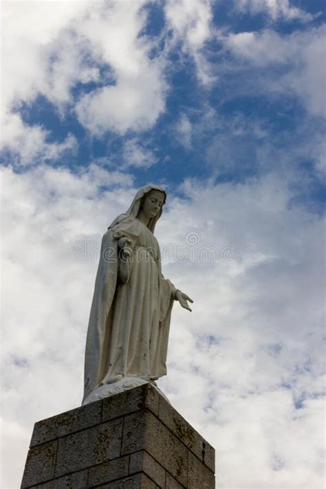 Religious Statue With Dramatic Skies Stock Image Image Of Blue