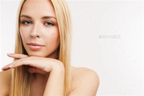 Half Naked Blonde Woman Posing And Looking At Camera Stock Photo By Vadymvdrobot