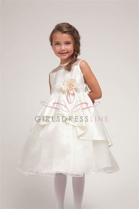 Ivory Organza Sleeveless T Length Beaded And Overlayed Flower Girl Dress