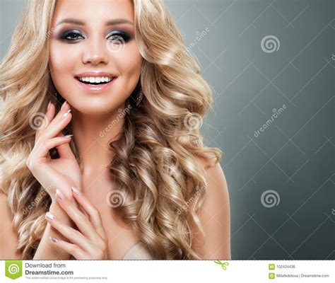 Beautiful Blonde Woman With Long Healthy Wavy Hair Stock