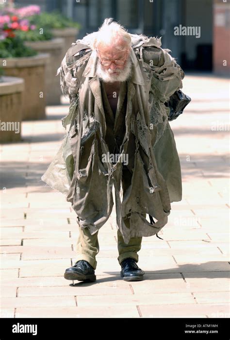 Tramp Homeless Man Walking The Streets In Edinburgh Scotland Stock Photo Alamy