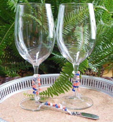Items Similar To Set Of 2 Coral And Navy Beaded Wine Glasses And Cheese Spreader On Etsy