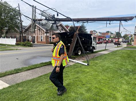 Power Outages Reported As Utility Pole Is Toppled Over Closing