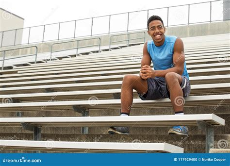 Teenage Athlete Sitting On The Bleachers Stock Photo Image Of