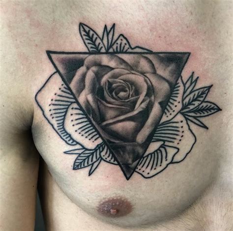 25 best chest tattoos for men. Blackwork and Realistic Rose Chest Tattoo by Mike Franco ...