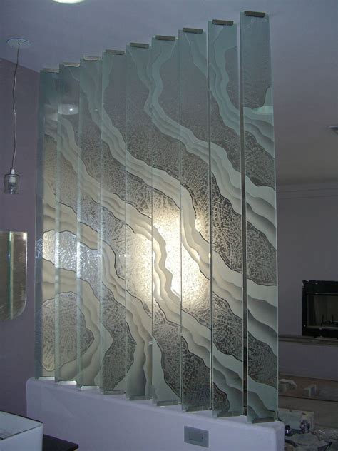 We are a specialty glass company that creates and produces glass countertops, glass backsplashes, glass sinks, as well as: etched decorative art glass surges wall divider - a photo ...
