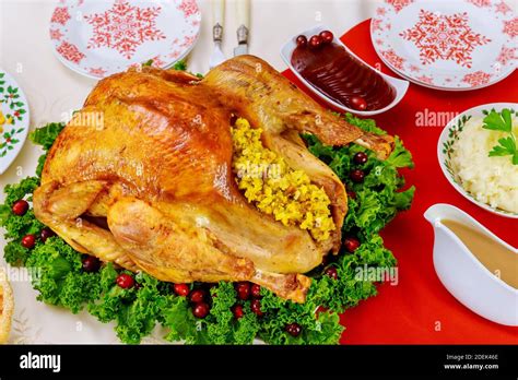 Roasted Whole Turkey For Christmas Dinner Table Setting Stock Photo