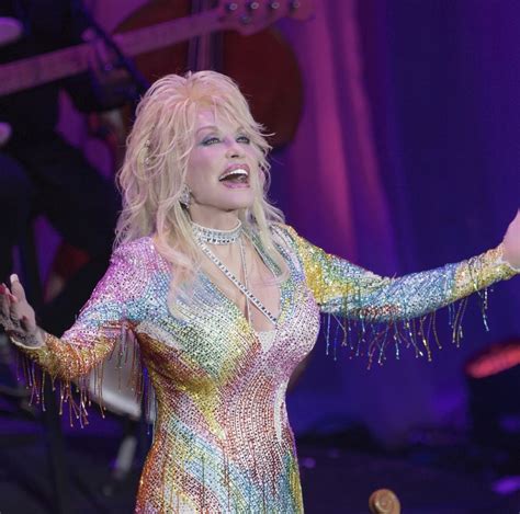 ‘it s not true dolly parton addresses age long rumour about insuring her breasts mojidelano