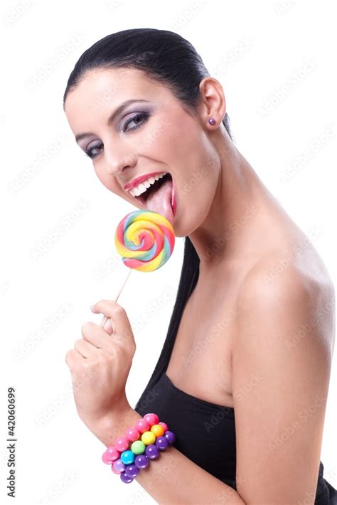 Sexy Woman Licking Lollipop Smiling Stock Photo Adobe Stock