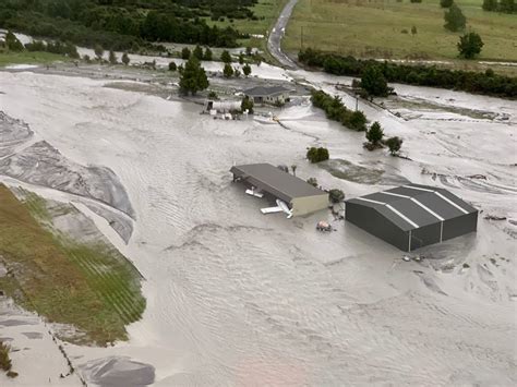 Floodwaters cover large tracts of land around the selwyn river yesterday. New Zealand - Floods Destroy Roads and Bridge After Record ...