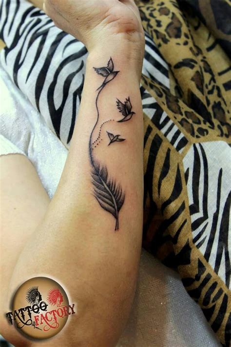 83 attractive back tattoo designs for women. Feather with flying birds | Believe tattoos, Hand tattoos ...