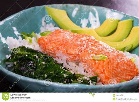 Salmon With Spinach And Avocado Rice As A Garnish Stock Image Image