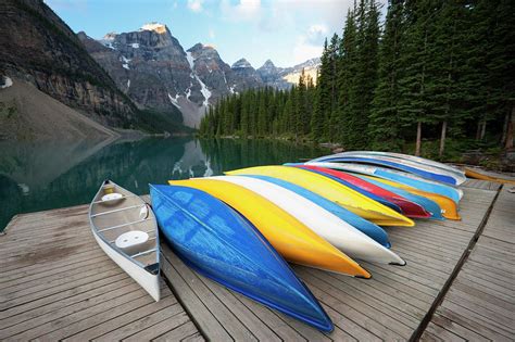 Colourful Canoes At Moraine Lake By Martin Child