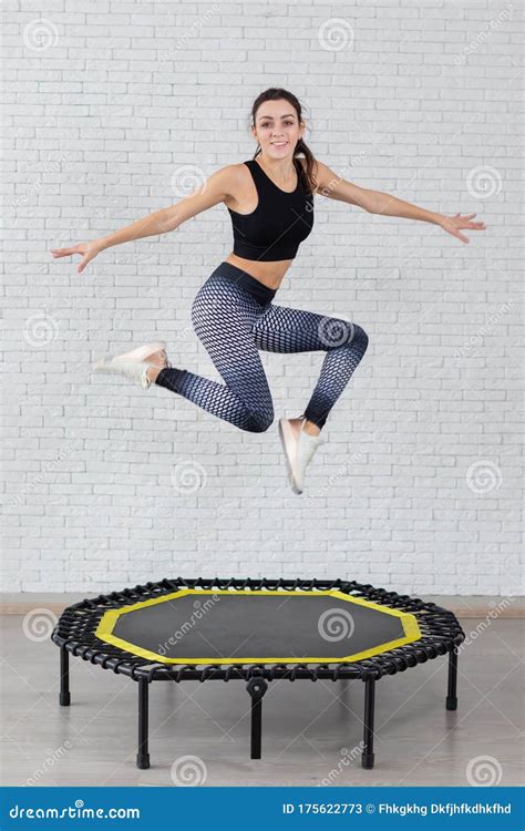 relaxed woman jumping on trampoline stock image image of energy female 175622773