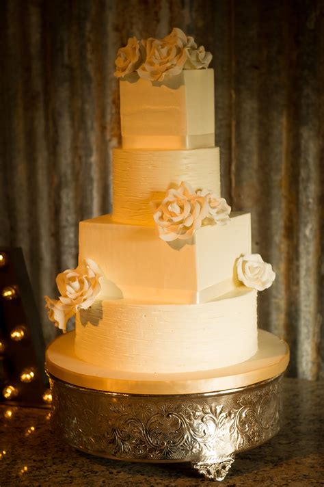 Round And Square Ivory Wedding Cake