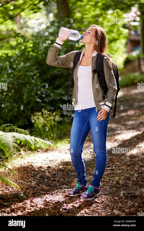 Woman Walking In Countryside Stock Photo Alamy