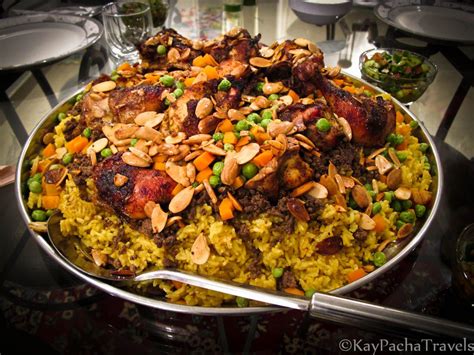 A twist on a middle east recipe with a splash of afghan and central asia. Oozie -- Jordanian dish with lamb, ground beef, spices, rice, chicken, peas+carrots, nuts ...