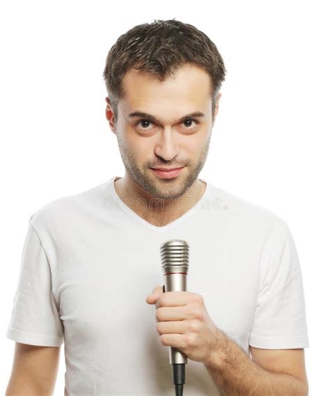 Young Man Holding A Microphone Stock Image Image Of Background