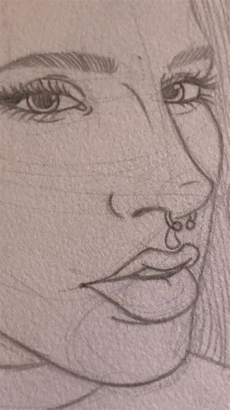A Pencil Drawing Of A Womans Face