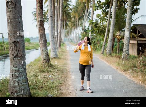 Pregnant Woman Drink Water Bottle While Workout Stock Photo Alamy