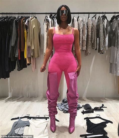 kim kardashian flaunts her hourglass curves in a skin tight pink bodysuit celebrities nigeria