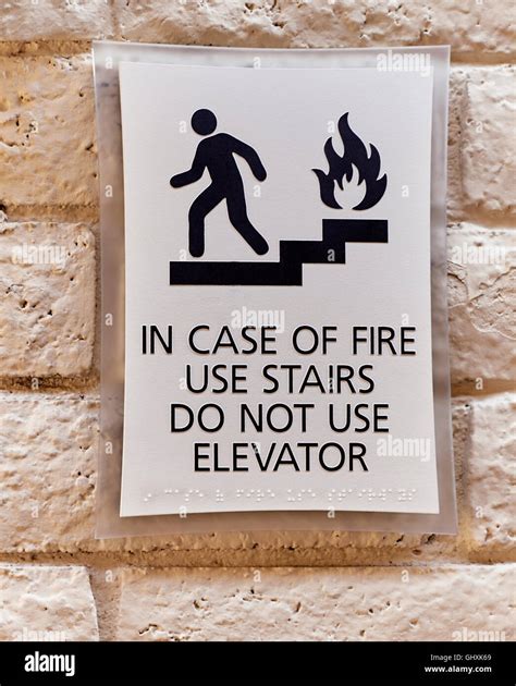 In Case Of Fire Use Stairs Do Not Use Elevator Warning Sign Stock Photo