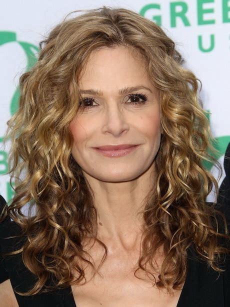 This is a daisy curly hairstyle, with the soft curls all over the head. Hairstyles for older women with long hair