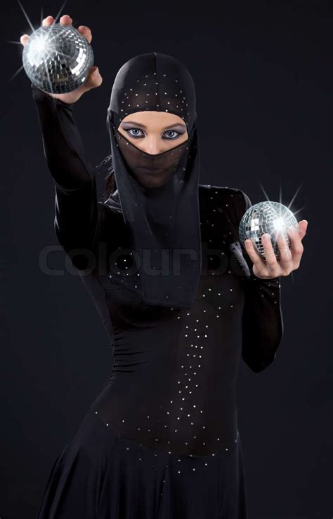 Party Dancer In Ninja Dress With Disco Balls Stock Image Colourbox