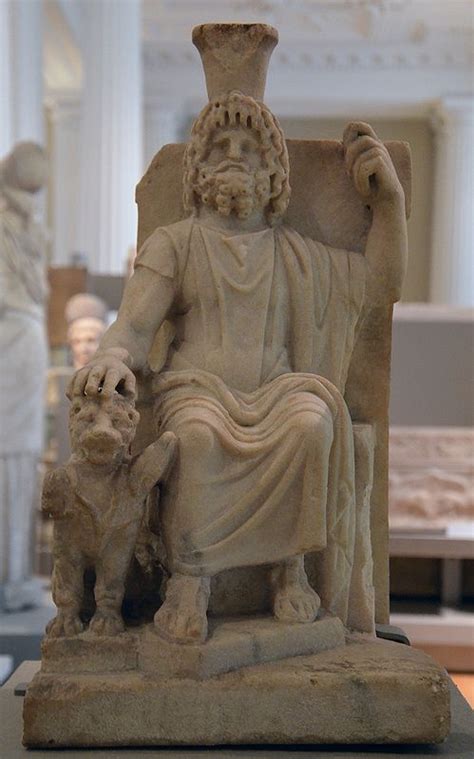 Marble Statue Of Serapis Seated On A Throne And Resting One Hand On