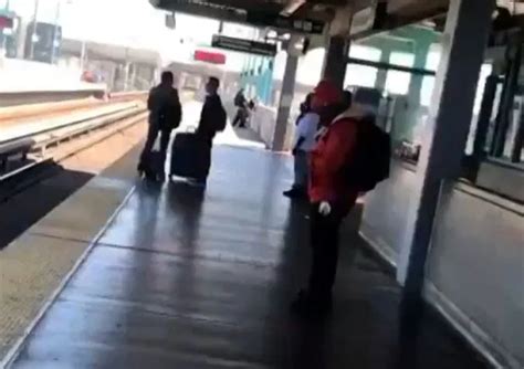 viral video brazen couple filmed doing it in broad day light on a train station