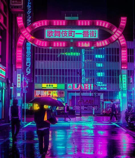 People Walking In The Rain With Umbrellas Under Neon Lights On A City