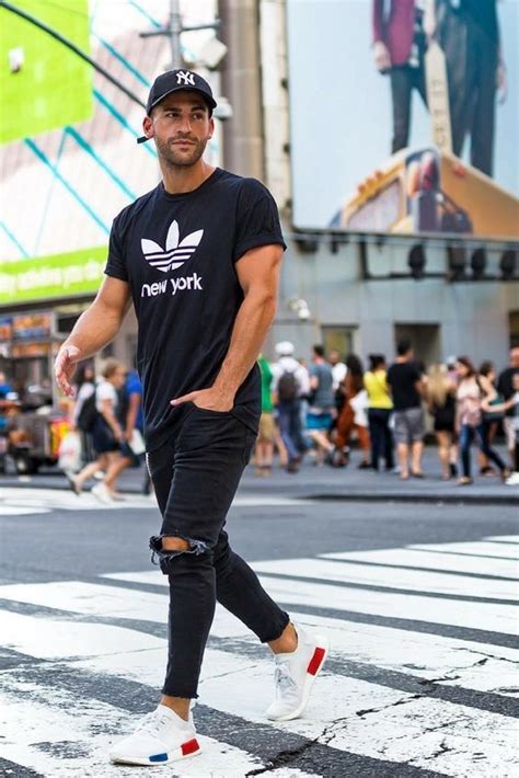 Sporty Look With Black Ripped Jeans A Black Tee And White