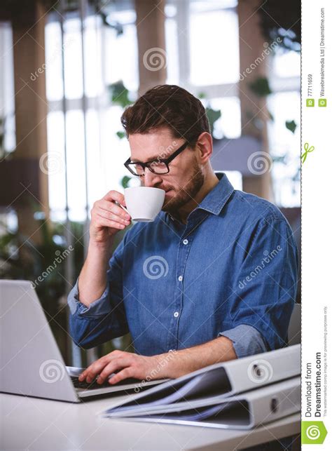 Businessman Drinking Coffee At Creative Office Stock Image Image Of