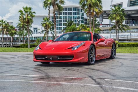 Anything over 200 miles costs you $4.95/mile. Ferrari 458 Coupe Rental in Miami. This Says Miami!