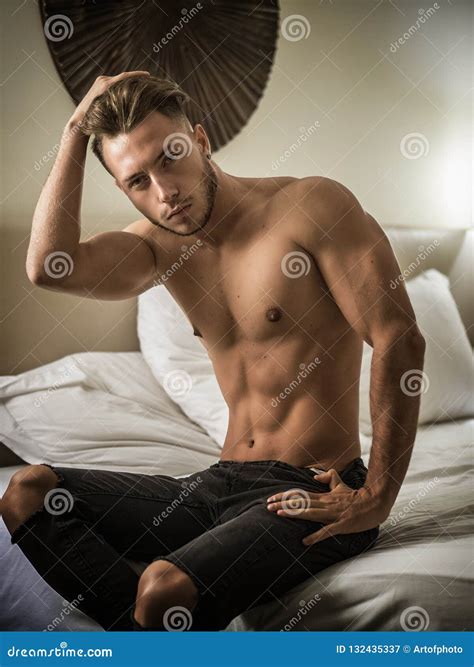 Shirtless Male Model Lying Alone On His Bed Stock Image Image Of Home