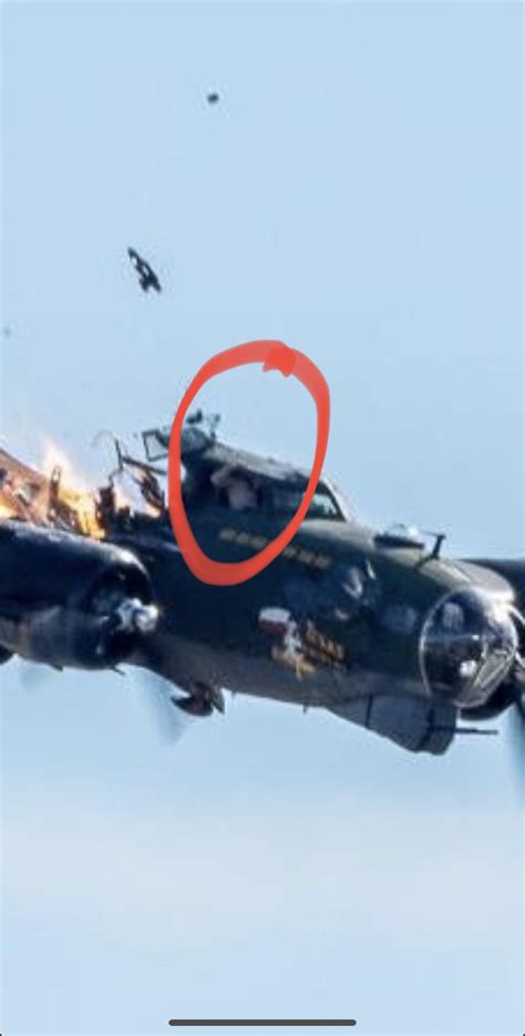 Passenger Holding To The Frame Of B 17 During The Mid Air Collision In