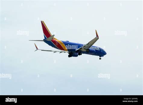 A Southwest Airlines plane makes its final descent towards Phoenix Sky