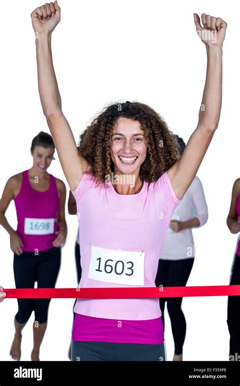 Female Athlete Crossing Finish Line Hi Res Stock Photography And Images