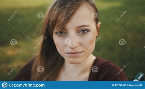 Portrait Of Beautiful Young Caucasian Paralyzed Woman In Wheelchair