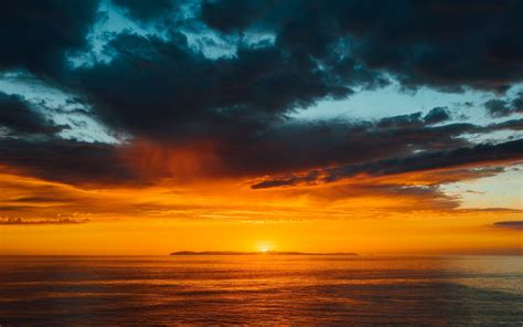 Download Wallpaper 1440x900 Sea Clouds Horizon Clam Sea Sunset