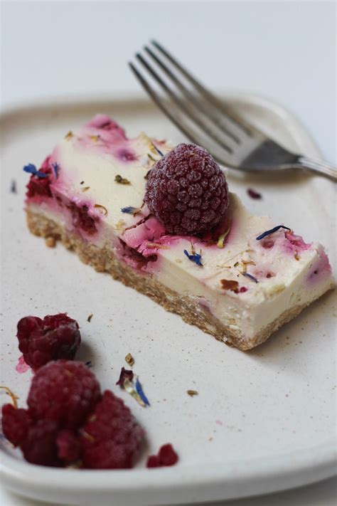 The refreshing berries meld with the creaminess of the cheesecake filling as the center of the soft and crumbly cookie bars. Raspberry Cheesecake Slice | Recipe | Raspberry cheesecake ...