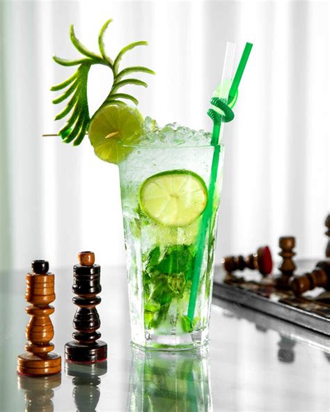 Free Photo Mojito Glass Garnished With Lime And Zest