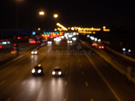 Blurred Cars Driving On A Motorway At Night Seeing Bokeh Car