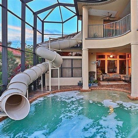 24 Awesome Home Indoor Pool Design With Slide To Make Your Kids Have