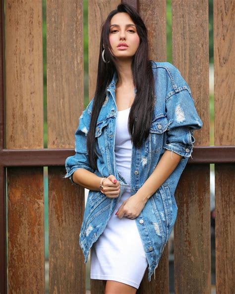 Nora is mostly known for her gorgeous look and glamorous style in the movie. Nora Fatehi Teaches Us How To Ace Long Denim Jackets With Her Latest Look! | The Prevalent India ...