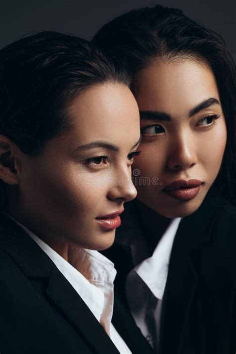 Portrait Of Two Young Women Posing In Studio Stock Photo Image Of