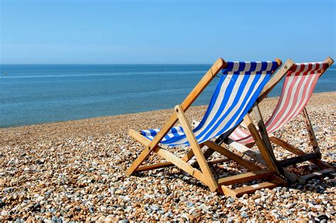 Personalised deck chairs with your photos or designs. uk-beach-summer-deck-chairs | Carbon Brief