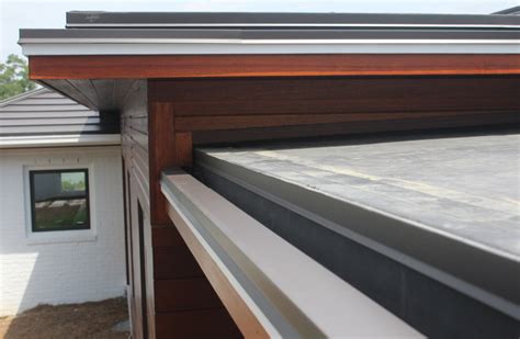 2 A Roof Above And Below Flat Roof House Gutters Roof Styles