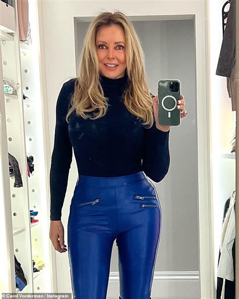 Carol Vorderman Shows Off Her Incredible Curves In Skin Tight Pvc Trousers And Knee High Boots