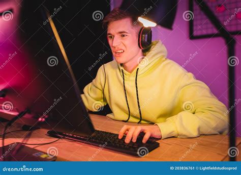 Concentrated Young Gamer In Headset Play Stock Image Image Of